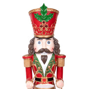 NUTCRACKER diótörő figura magyallevéllel díszített piros fejfedője