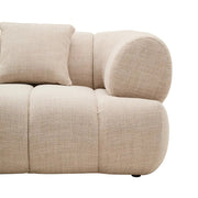 Krémszínű, 3 személyes formatervezett design kanapé.