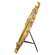 Barokkos levéldíszekkel díszített, antikot felületű, aranyszínű asztali fényképtartó képkeret.