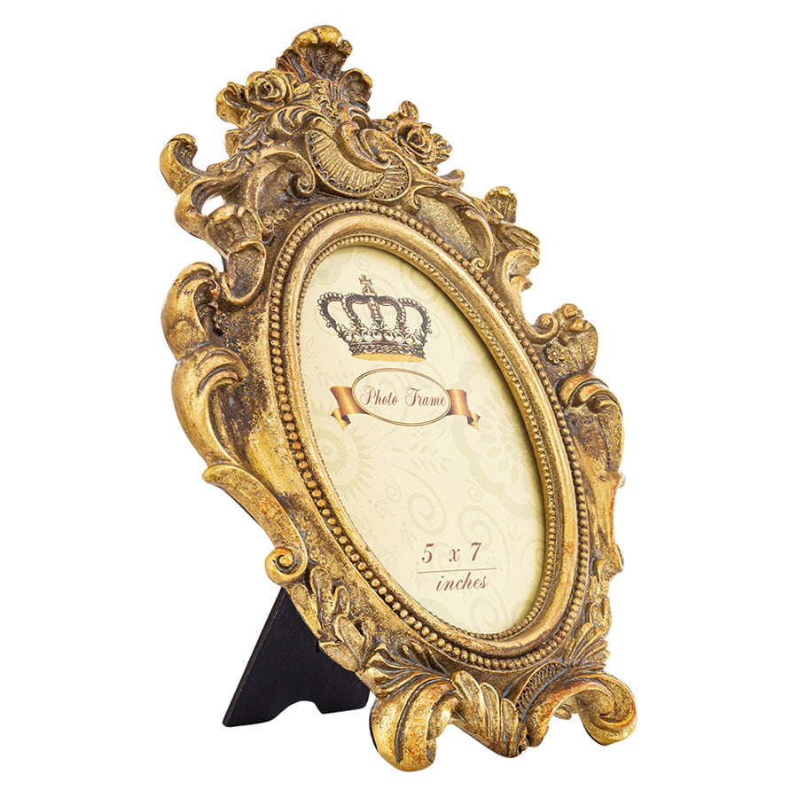 Barokkos levéldíszekkel díszített, antikot felületű, aranyszínű asztali fényképtartó képkeret.