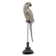 Ezüstszínű, dekoratív papagáj figura.