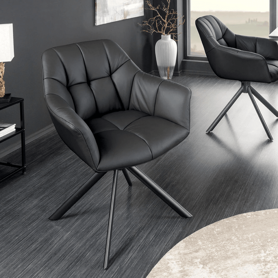 Fekete színű, valódi bőrrel kárpitozott, 180 fokban forgatható, design szék.