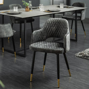 Szürkészöld színű bársonnyal kárpitozott, design étkezőszék.