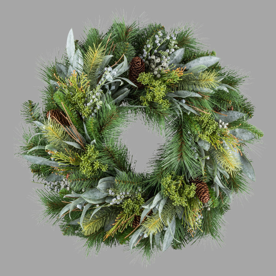 Zöld színű, mű fenyő mix koszorú.