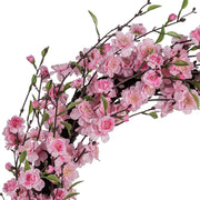 Rózsaszín, cseresznyevirág koszorú.