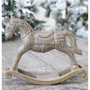 Natúr színű, fa hatású karácsonyi hintaló.