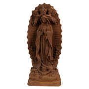 Rozsdabarna színű, antikolt felületű Madonna figura.