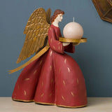 SACRED angyal figura gyertyatartó, arany szárnyakkal és kézzel tartott gyertyatálcával