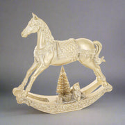 Aranyszínű karácsonyi hintaló.