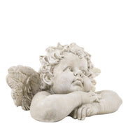 Kőhatású puttó figura.