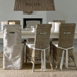 vintage rattan szék étkezőasztal mellett