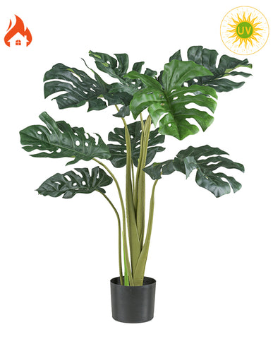 Zöld színű filodendron műnövény.