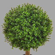 Zöld színű buxus fa műnövény.