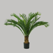 Zöld színű cikász pálma műnövény.