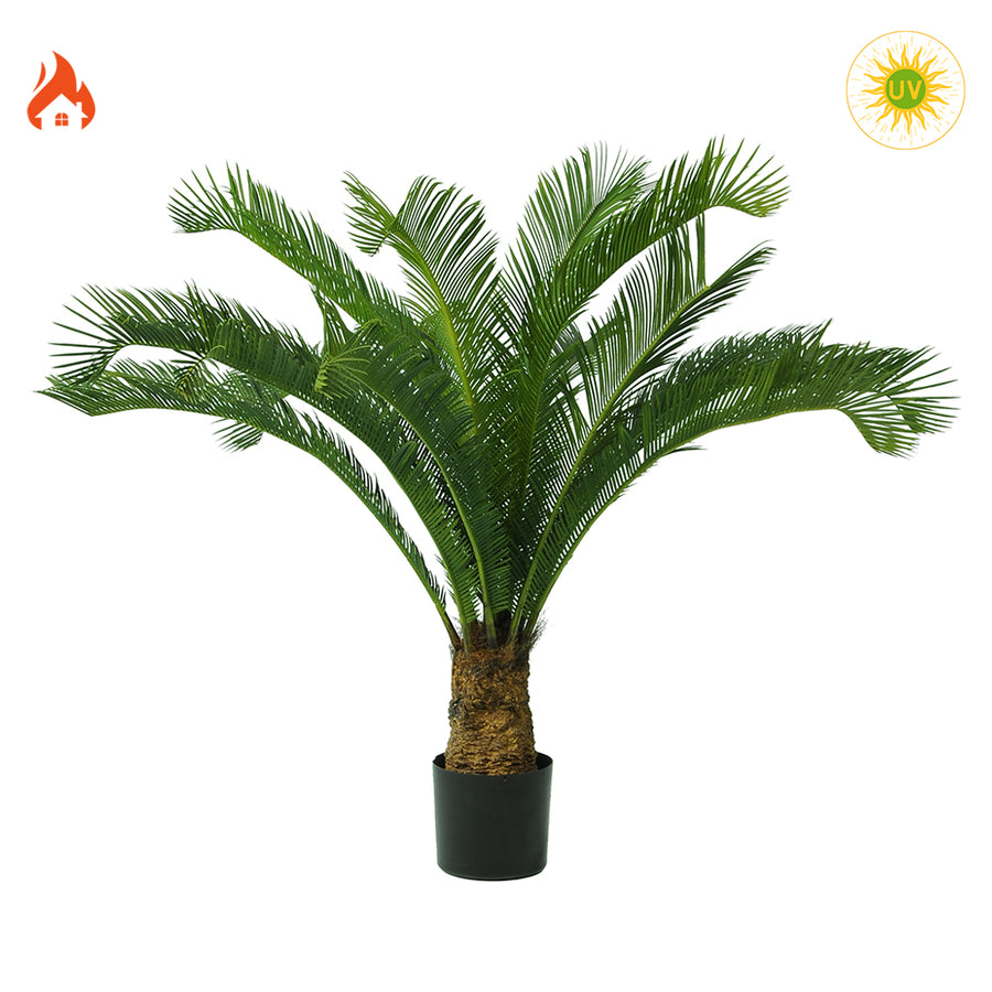 Zöld színű cikász pálma műnövény.