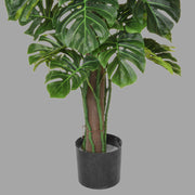 Zöld színű filodendron műnövény.