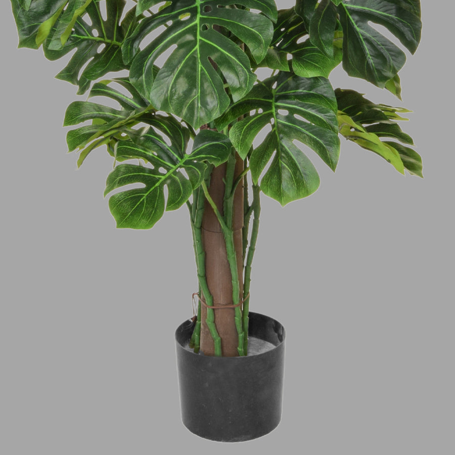 Zöld színű filodendron műnövény.