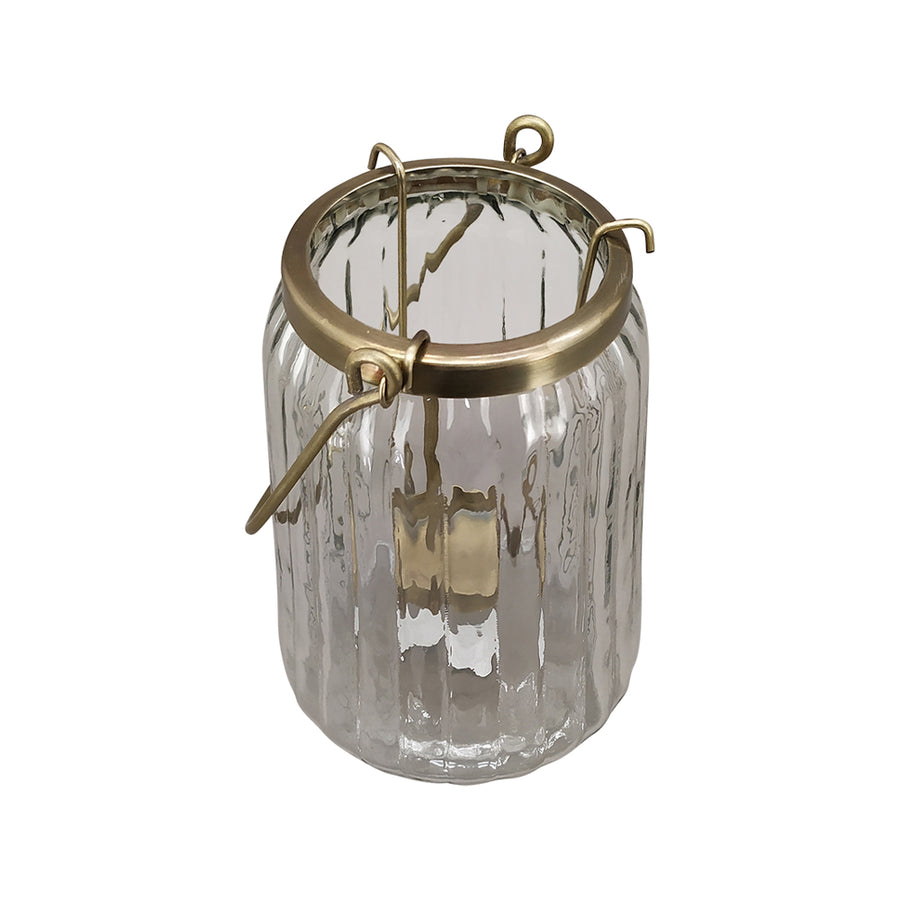 Bordázott üvegből és aranyszínű alumíniumból készült mécsestartó.