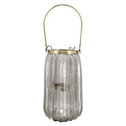 Bordázott üvegből és aranyszínű alumíniumból készült mécsestartó.