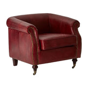 Vintage-loft stílusú, bordó színű, enyhén antikolt bőrrel kárpitozott fotel.