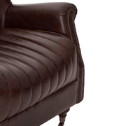 Vintage-loft stílusú, kávébarna színű bőrrel kárpitozott, szárnyas klubfotel.