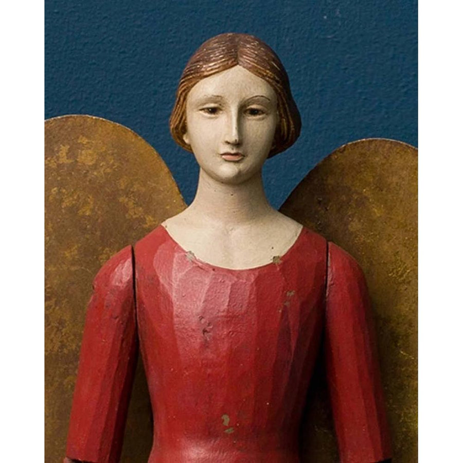 Bordó színű orléans-i angyal figura.