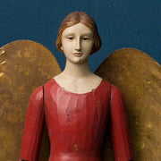 Bordó színű orléans-i angyal figura.