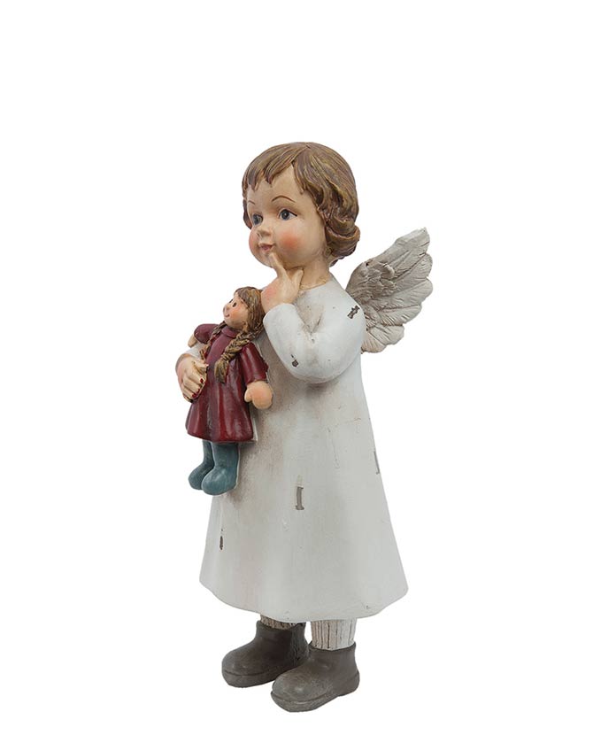 Játékbabát tartó karácsonyi angyalka.