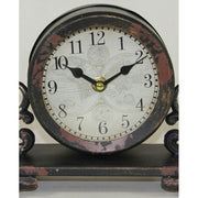 Antikolt felületű fém asztali óra.