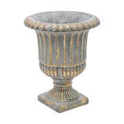 Rusztikus, antikolt felületű, kannelúrás díszítésű, arany-szürke színű cement kaspó.