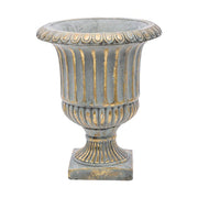 Rusztikus, antikolt felületű, kannelúrás díszítésű, arany-szürke színű cement kaspó.