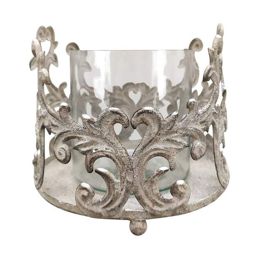 Antikolt felületű,, üvegbetétes fém mécsestartó.