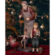 Karácsonyi kisfiú bohóccal és dobbal.