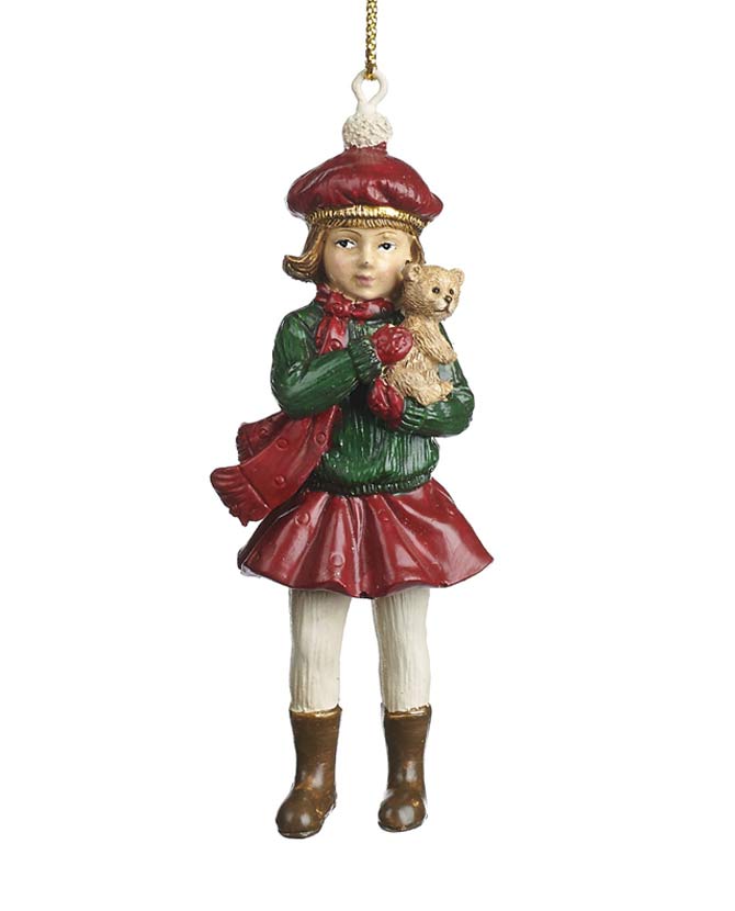 Mackót tartó, piros és zöld színárnyalatú téli kislány formájú karácsonyfadísz.