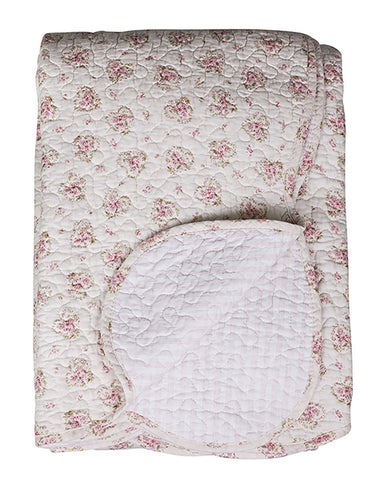 Apró rózsaszín virágokkal díszített, krémszínű, steppelt kialakítású, vintage takaró paplan.