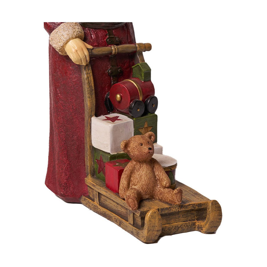 Vintage Télapó ajándékokkal megrakott szánkóval.