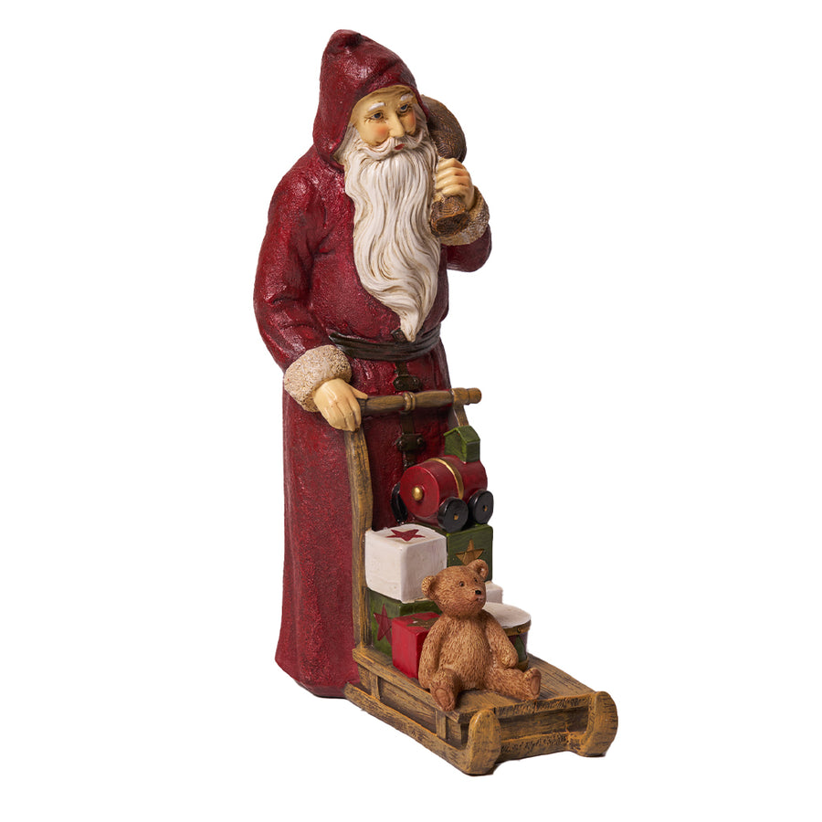 Vintage Télapó ajándékokkal megrakott szánkóval.