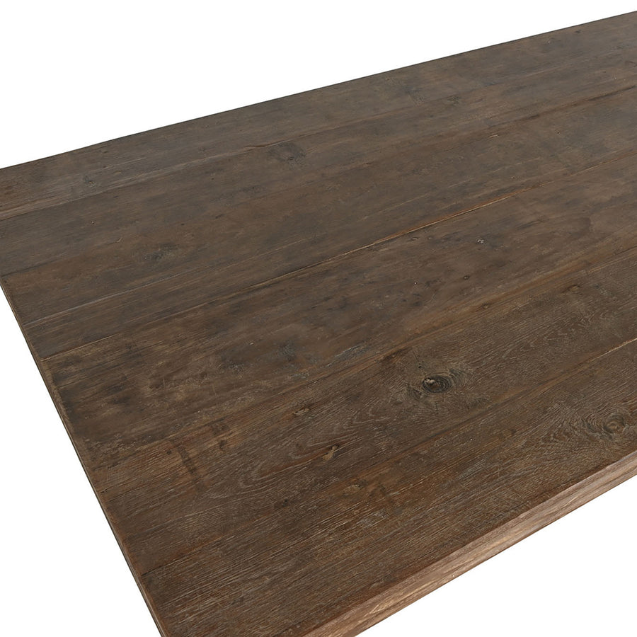 Natúr színű, díszes lábú teakfa étkezőasztal.