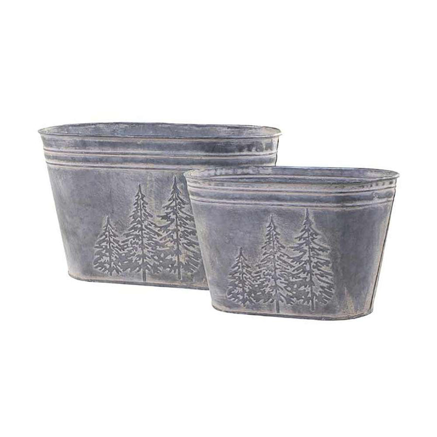 Vidéki stílusú, antikolt felületű, fenyőfa formájú dombormintákkal díszített, kétdarabos, ovális formájú, karácsonyi bádog kaspó szett.