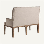 Klasszikus, koloniál stílusú, mangófából készült, ekrü színű, vászon hatású poliészter kárpittal kárpitozott 2 személyes szófa.