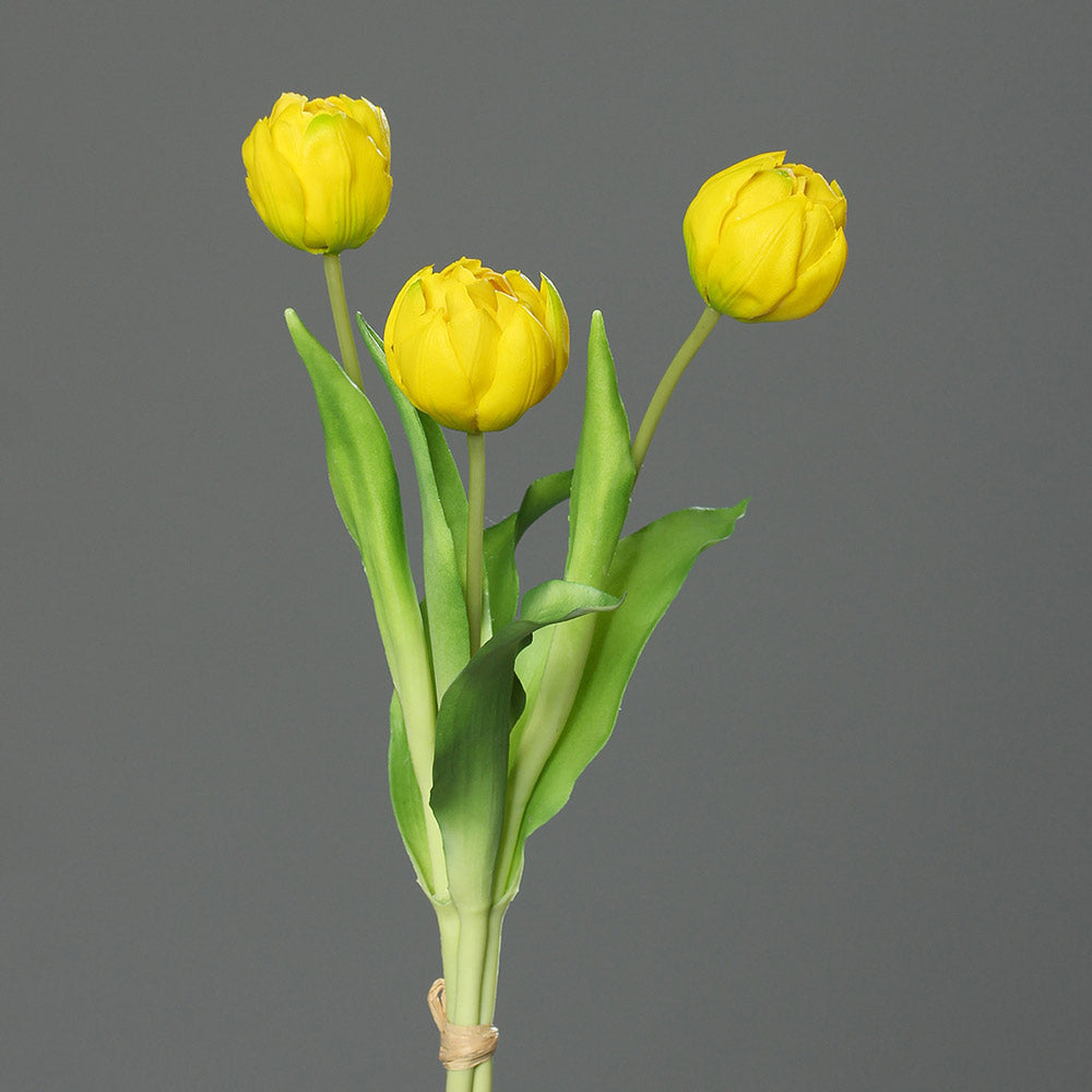 3 szálból álló, sárga színű tulipáncsokor művirág..