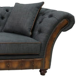 Chesterfield stílusú, mély gombos díszítésű, cserzett vintage angol marhabőrrel és ón színű bútorszövettel kárpitozott 3 személyes kanapé.
