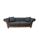 Chesterfield stílusú, mély gombos díszítésű, cserzett vintage angol marhabőrrel és ón színű bútorszövettel kárpitozott 3 személyes kanapé.