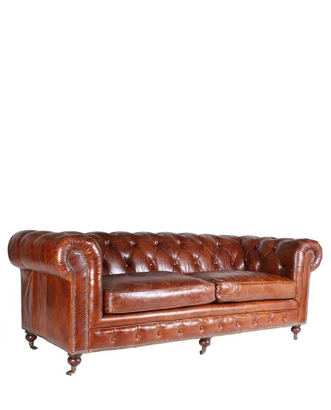 Klasszikus stílusú, vintage dohánybarna színű bőr Chesterfield kanapé.