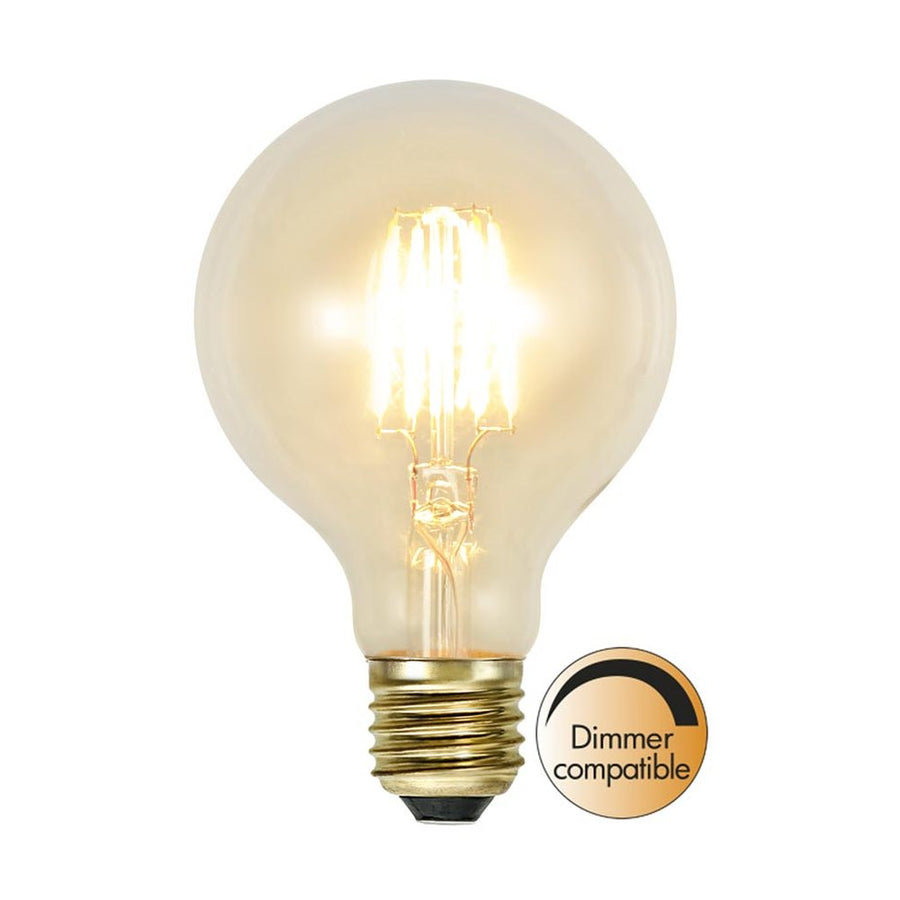 Clear Filament dekorációs izzó. Meleg fehér fényű LED dekorációs izzó áttetsző üveggel.