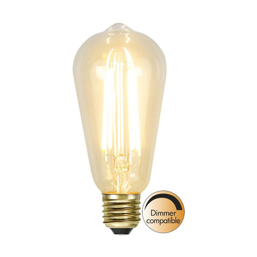 Clear Filament dekorációs izzó. Meleg fehér fényű LED dekorációs izzó áttetsző üveggel.