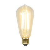 Clear Filament dekorációs izzó. Meleg fehér fényű LED dekorációs izzó áttetsző üveggel.