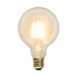 Clear Filament dekorációs izzó. Meleg fehér fényű LED dekorációs izzó áttetsző üveggel.