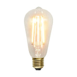 Clear Filament dekorációs izzó. Meleg fehér fényű LED dekorációs izzó áttetsző üveggel.