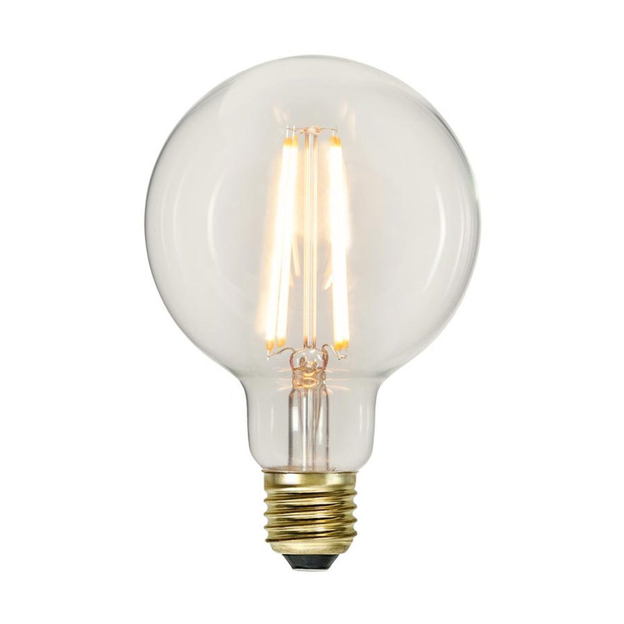 Clear Filament dekorációs izzó. Meleg fehér fényű LED dekorációs izzó áttetsző üveggel.